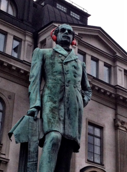 Statue with hearing protectors